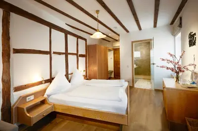 Ein Bett oder Betten in einem Zimmer der Unterkunft Gasthof Zum Lam