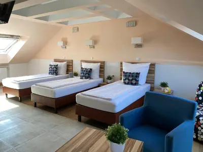 Ein Bett oder Betten in einem Zimmer der Unterkunft Hotel am Hafen