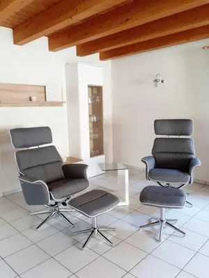 Ein Sitzbereich in der Unterkunft Ferienunterkünfte Zur Mühle
