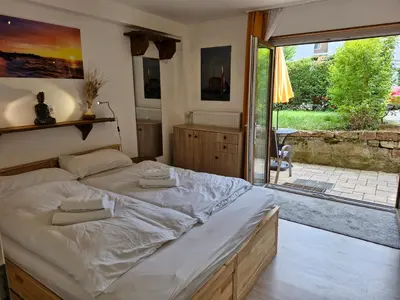 Ein Bett oder Betten in einem Zimmer der Unterkunft FVH Family Vacation Heidelberg