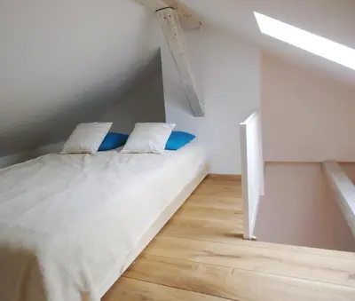 Ein Bett oder Betten in einem Zimmer der Unterkunft Ferienwohnung am Schloss
