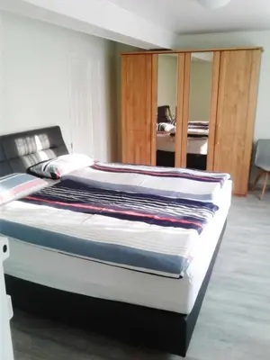 Ein Bett oder Betten in einem Zimmer der Unterkunft Kreuzdellenhof Ferienzimmer