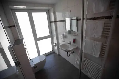 Ein Badezimmer in der Unterkunft Heilbronner Hotel am schönen Theater