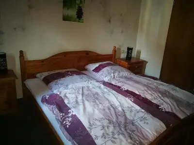 Ein Bett oder Betten in einem Zimmer der Unterkunft Eulenburg