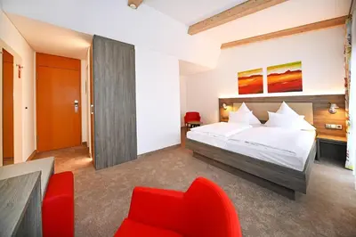 Ein Bett oder Betten in einem Zimmer der Unterkunft GenoHotel Karlsruhe