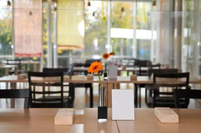 Ein Restaurant oder anderes Speiselokal in der Unterkunft GenoHotel Karlsruhe