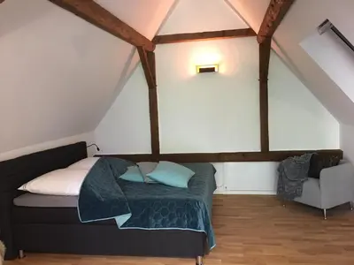 Ein Sitzbereich in der Unterkunft Apartment für zwei Personen in romantischem Weindorf