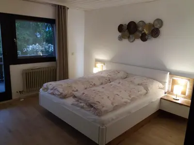 Ein Bett oder Betten in einem Zimmer der Unterkunft Ferienwohnung Lingenfelder