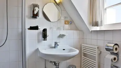 Ein Badezimmer in der Unterkunft Hotel Am Schloss