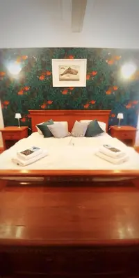 Ein Bett oder Betten in einem Zimmer der Unterkunft Privathotel Der Schwarze Herrgott No TV