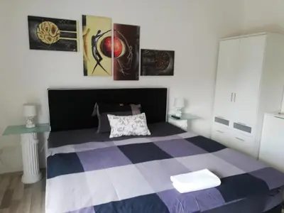 Ein Bett oder Betten in einem Zimmer der Unterkunft Villaci Business Apartments
