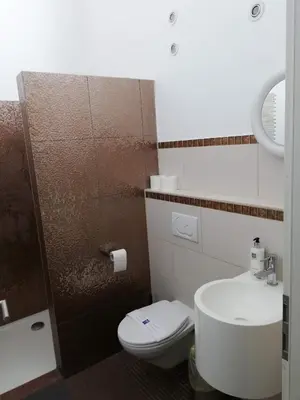 Ein Badezimmer in der Unterkunft Villaci Business Apartments