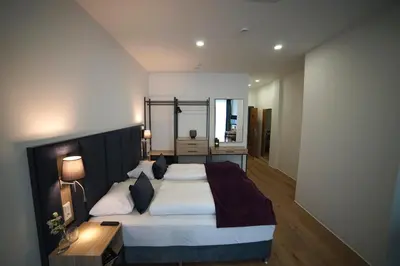 Ein Bett oder Betten in einem Zimmer der Unterkunft DIWOTEL by Trip Inn Frankfurt Airport Dreieich