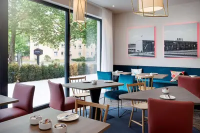 Ein Sitzbereich in der Unterkunft Hampton By Hilton Kaiserslautern