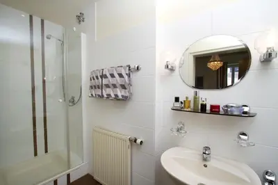 Ein Badezimmer in der Unterkunft Gästehaus Hebinger am Schlosspark