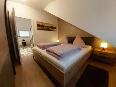 Ein Bett oder Betten in einem Zimmer der Unterkunft Apartment Claudia