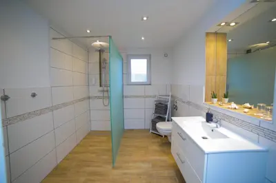 Ein Badezimmer in der Unterkunft Apartment Claudia