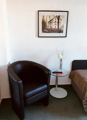Ein Sitzbereich in der Unterkunft Hotel Mainzer Hof