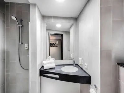 Ein Badezimmer in der Unterkunft B&B Hotel Heidelberg