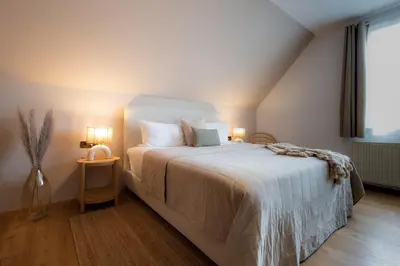Ein Bett oder Betten in einem Zimmer der Unterkunft Landhotel Sonnenhof