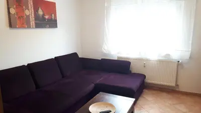 Ein Sitzbereich in der Unterkunft Ferienwohnung Jasmin in Schönau bei Heidelberg FEWO 2