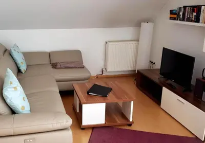 Ein Sitzbereich in der Unterkunft Ferienwohnung Weiß Wachtenburg
