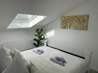 Ein Bett oder Betten in einem Zimmer der Unterkunft Prime Host apartments
