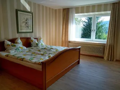 Ein Bett oder Betten in einem Zimmer der Unterkunft Burgblick-Fewo Töpfer