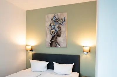 Ein Bett oder Betten in einem Zimmer der Unterkunft Prime Park Apartment Aschaffenburg mit Terrasse