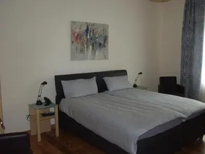 Ein Bett oder Betten in einem Zimmer der Unterkunft Exklusive Gästezimmer Landau
