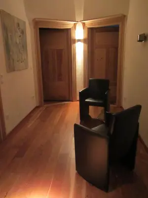 Ein Sitzbereich in der Unterkunft Exklusive Gästezimmer Landau