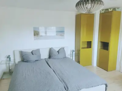 Ein Bett oder Betten in einem Zimmer der Unterkunft Ferienwohnung Forest & Wein