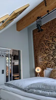 Ein Bett oder Betten in einem Zimmer der Unterkunft Appart-Hotel REB_ART