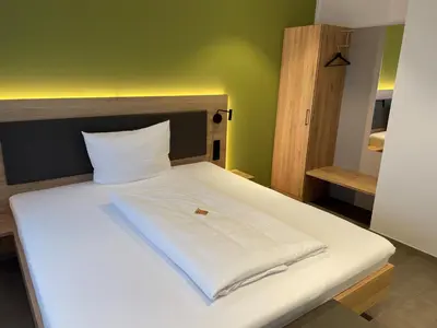 Ein Bett oder Betten in einem Zimmer der Unterkunft Weingut Bugner Meizelhof