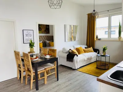 Ein Sitzbereich in der Unterkunft Aurum Apartment
