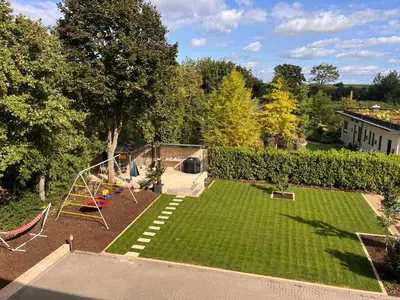 Ein Garten an der Unterkunft Ferienwohnung im Wonnegau Portugieser-Suite