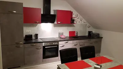 Küche/Küchenzeile in der Unterkunft Ferienwohnung im Wonnegau Portugieser-Suite
