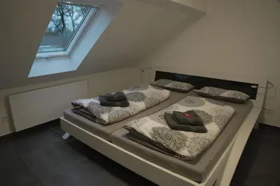 Ein Bett oder Betten in einem Zimmer der Unterkunft Luxury Apartment Weingarten