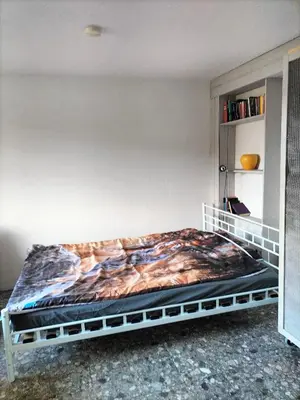 Ein Bett oder Betten in einem Zimmer der Unterkunft Pension Rosenblick