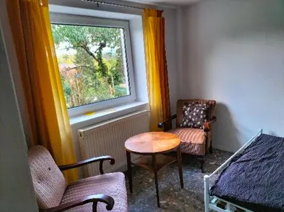 Ein Sitzbereich in der Unterkunft Pension Rosenblick