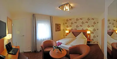 Ein Bett oder Betten in einem Zimmer der Unterkunft Hotel Nothwang