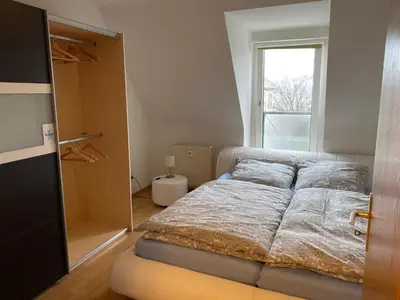 Ein Bett oder Betten in einem Zimmer der Unterkunft Ferienwohnung - Balkon, Klima, Parkplatz