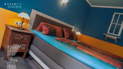 Ein Bett oder Betten in einem Zimmer der Unterkunft HOTEL ALTES THEATER Heilbronn