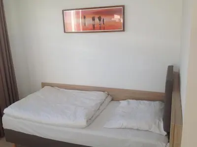 Ein Bett oder Betten in einem Zimmer der Unterkunft Hotel Rodgau