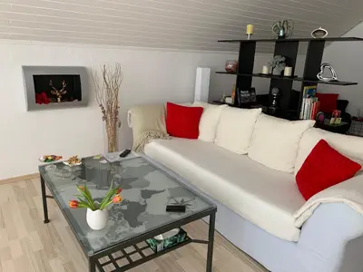 Ein Sitzbereich in der Unterkunft Apartment Adam