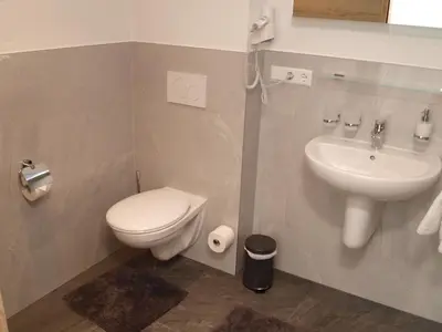 Ein Badezimmer in der Unterkunft Hotel Anker garni