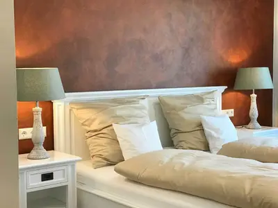 Ein Bett oder Betten in einem Zimmer der Unterkunft Lauras Weinherberge
