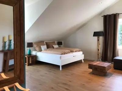 Ein Bett oder Betten in einem Zimmer der Unterkunft Lauras Weinherberge