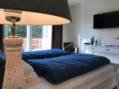 Ein Bett oder Betten in einem Zimmer der Unterkunft Lauras Weinherberge