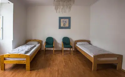 Ein Bett oder Betten in einem Zimmer der Unterkunft Ferienwohnung Glaser
